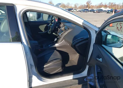 2014 Ford Focus Titanium from USA, damaged, VIN 1FADP3J20EL378488